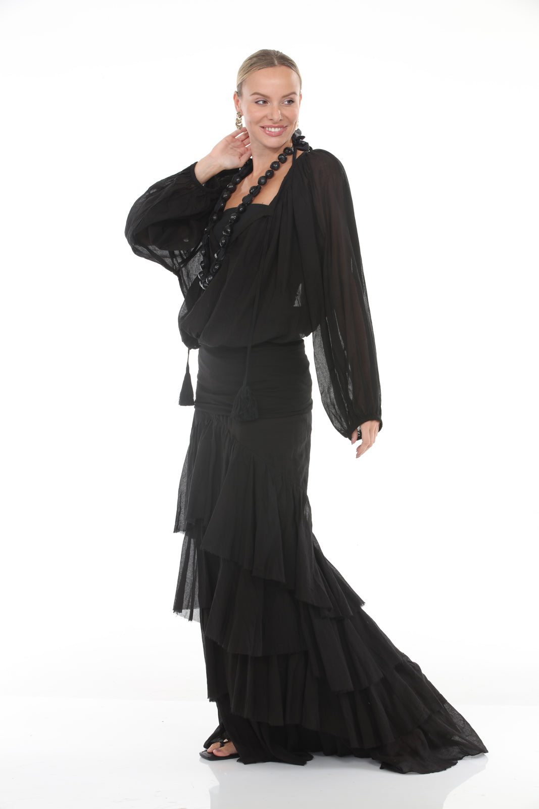 Cascade Ruffle Skirt | Black - side with long sleeve top