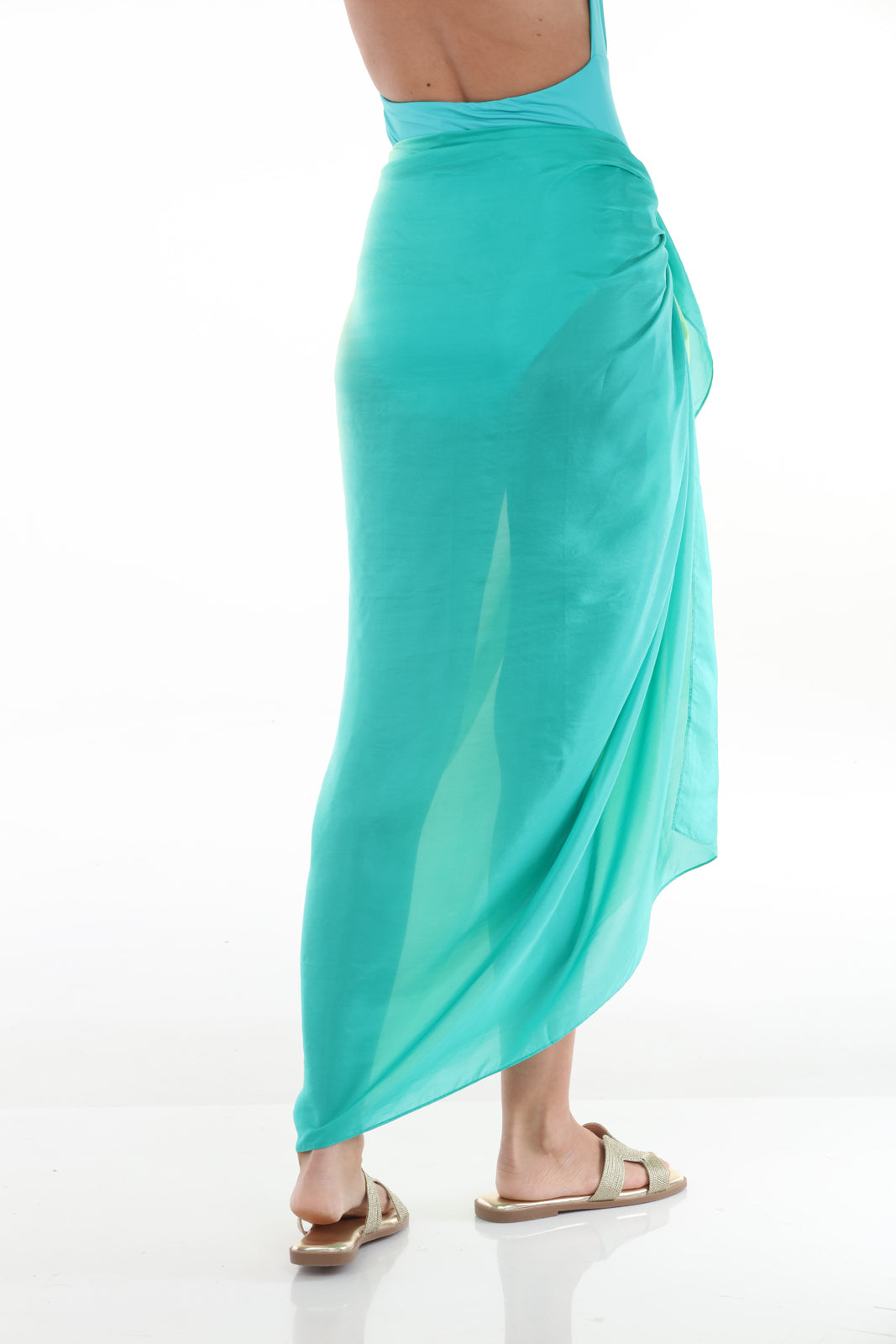 woman holding Dip Dye Pareo | Lime Green/Grass Green - closeup back