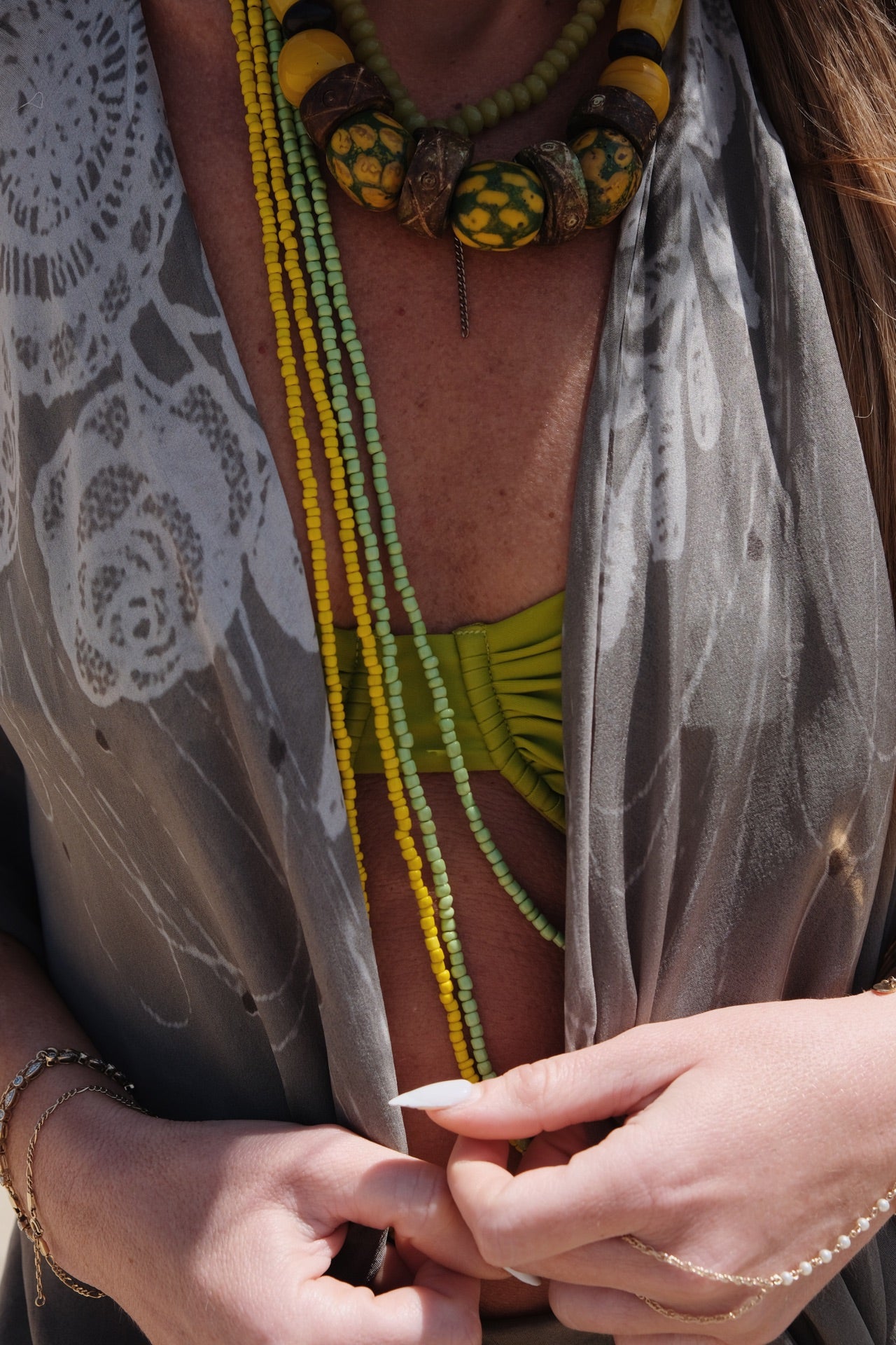 Closeup of woman wearing VACANCES Penelope Kimono Caftan