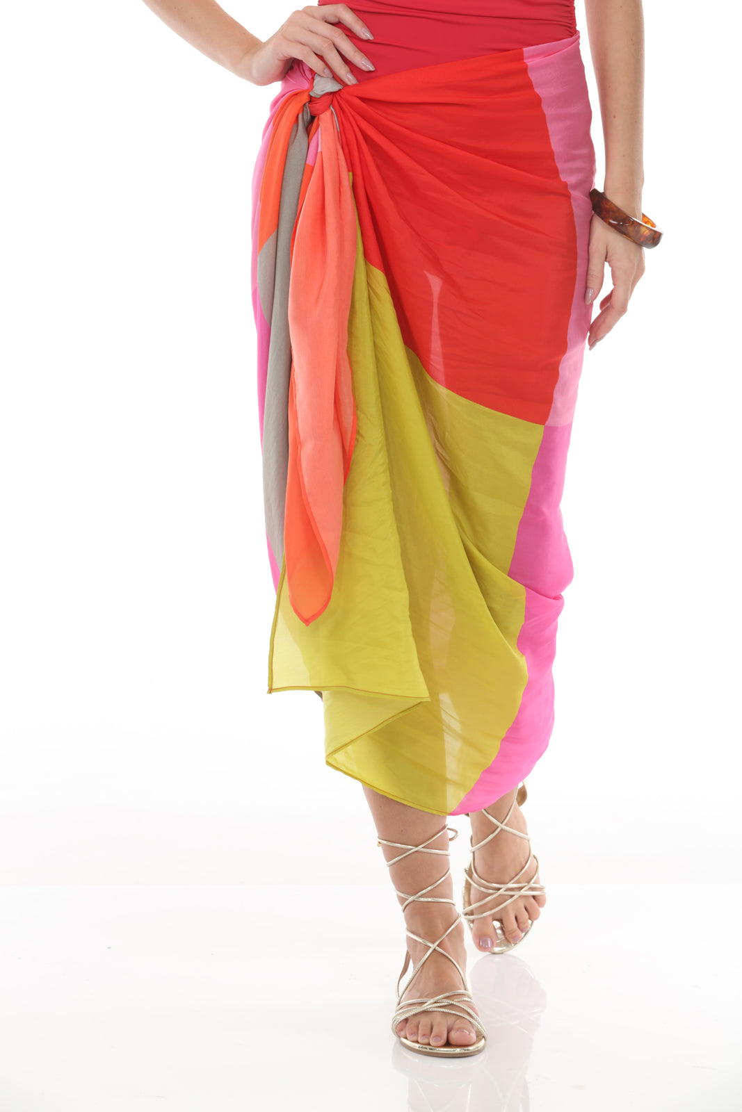 woman holding Pareo Squares Circus | Pink/Orange/Red/Yellow closeup